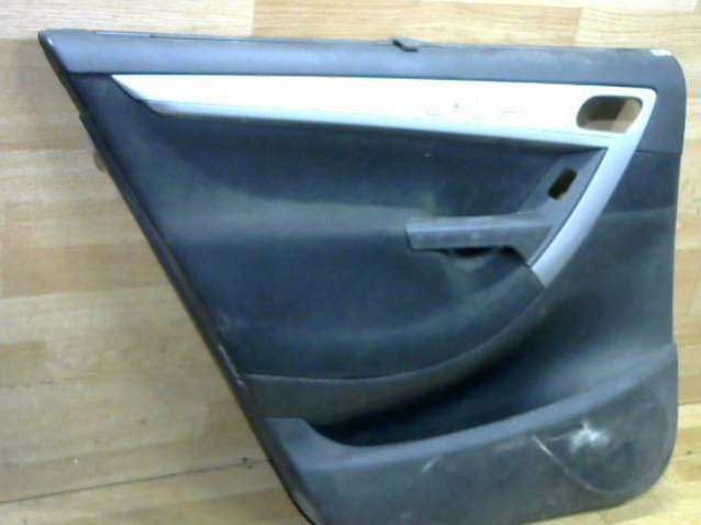 Обшивка двери задней левой (дверная карта)
